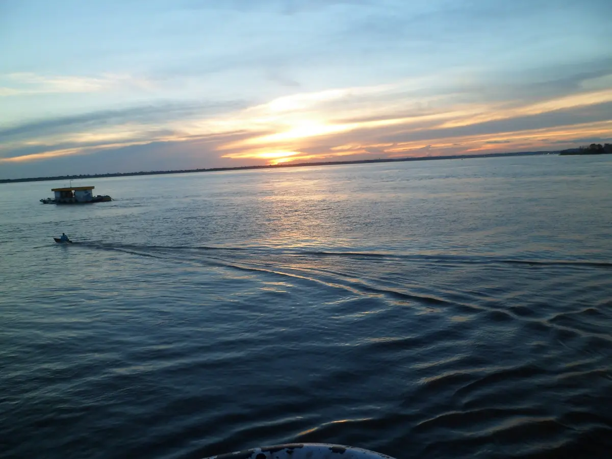 Dusk on the Solimões with a regional boat